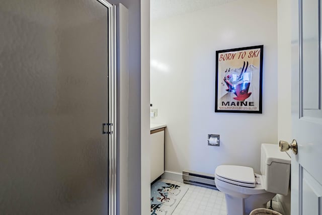 bathroom with a textured ceiling, baseboard heating, a shower with door, vanity, and toilet