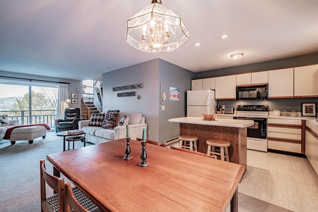 carpeted dining space with an inviting chandelier