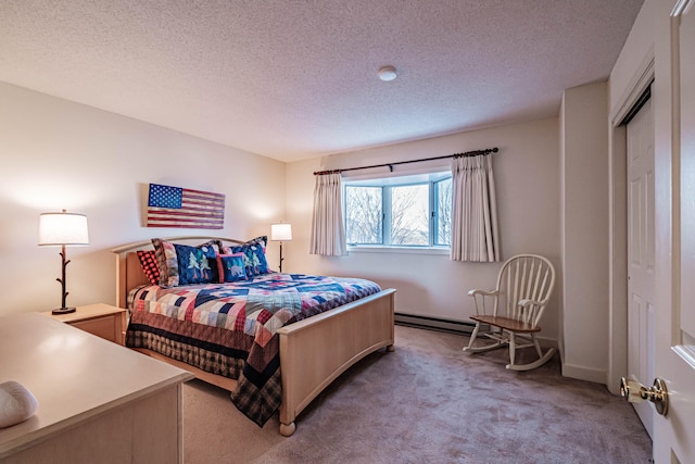 carpeted bedroom featuring a textured ceiling and a closet