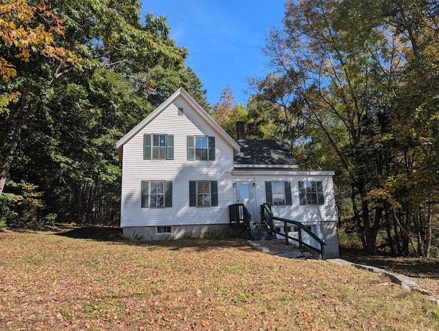 view of front of home with a front lawn