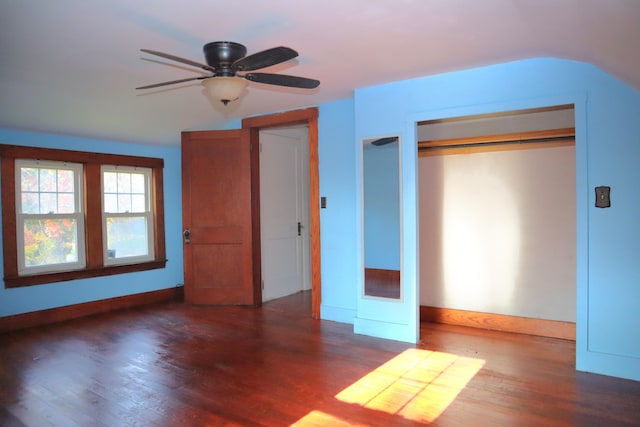 unfurnished bedroom featuring a closet, ceiling fan, and dark hardwood / wood-style floors