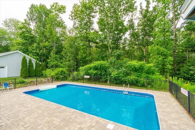 view of pool featuring a patio