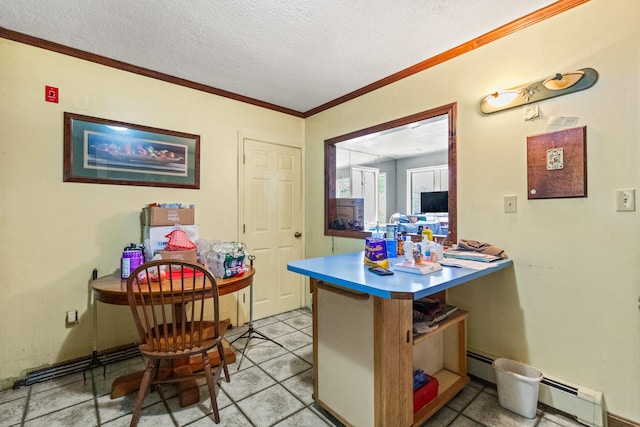 kitchen featuring kitchen peninsula, baseboard heating, crown molding, and a textured ceiling