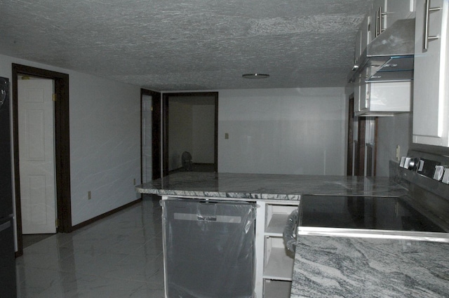 kitchen with black dishwasher, stainless steel electric range oven, and a textured ceiling