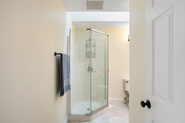 143 Beach Ave Unit 203, Kennebunk, ME 04043 - full bath with baseboards, a shower stall, toilet, and tile patterned floors