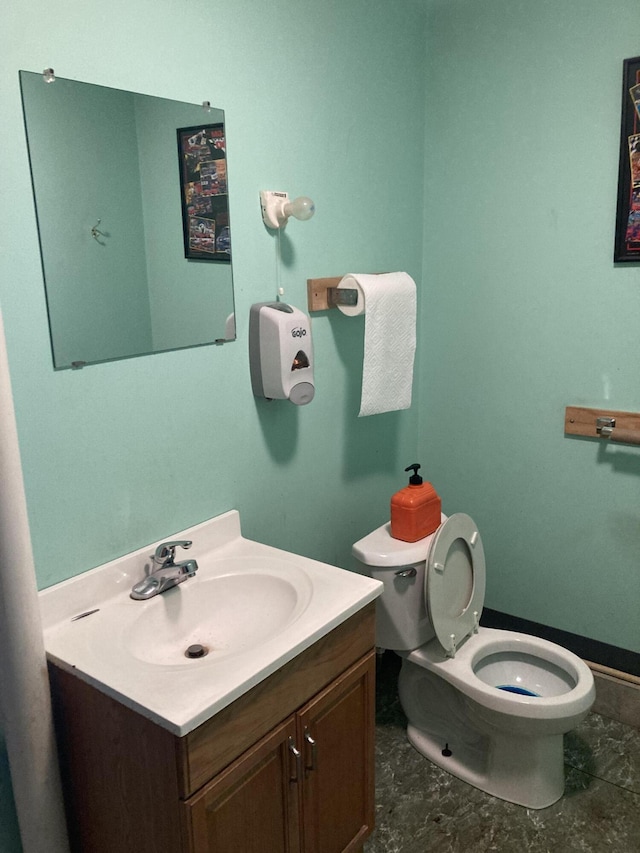 half bath with toilet and vanity