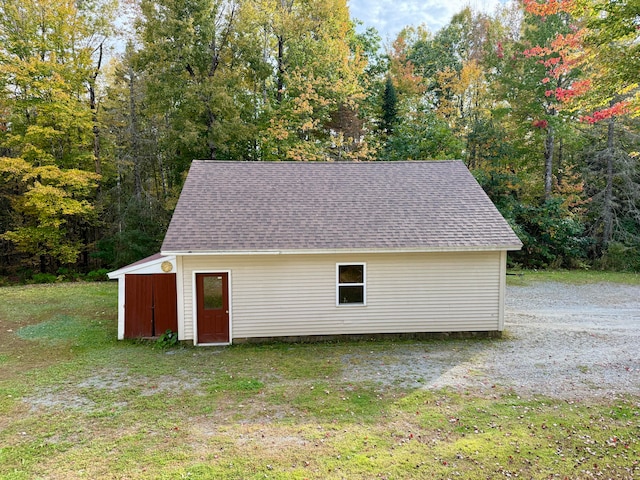 garage with a lawn