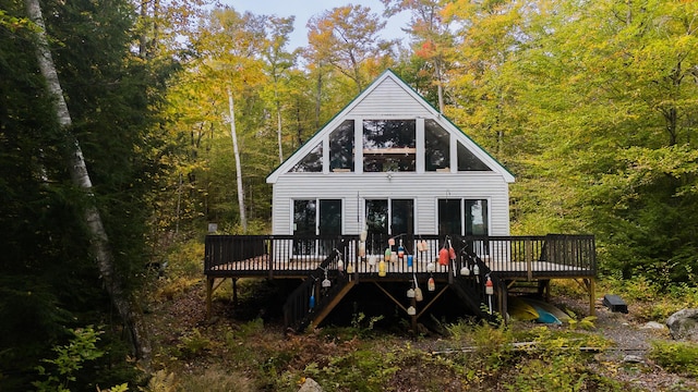 5-27 Cooks Is, Orneville Twp, ME 04463 - rear view of house featuring a deck and a forest view