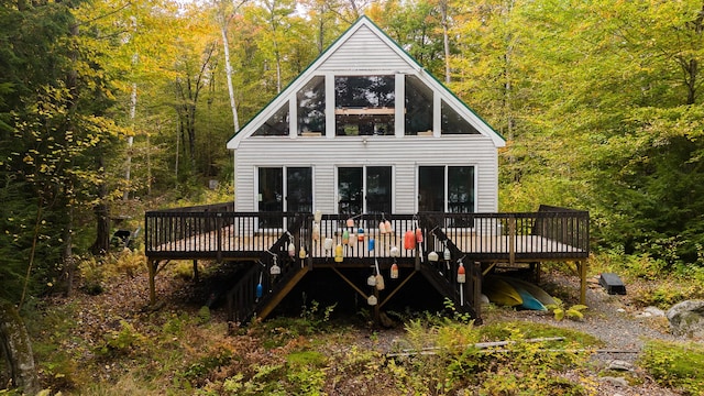 5-27 Cooks Is, Orneville Twp, ME 04463 - rear view of house with a forest view, a wooden deck, and stairway