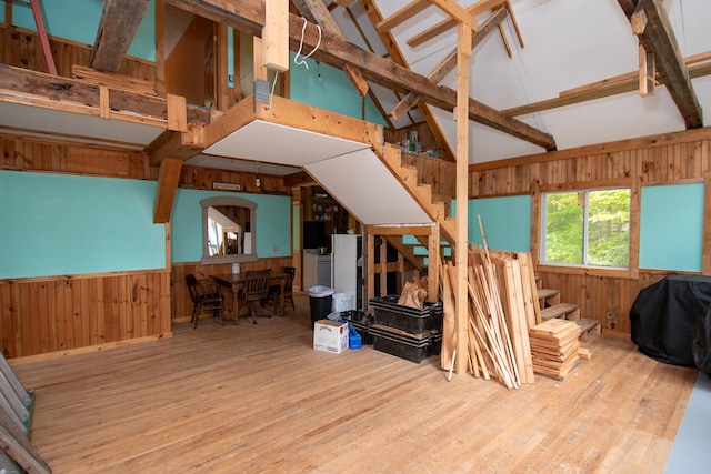5-27 Cooks Is, Orneville Twp, ME 04463 - living area with stairs, wooden walls, wood finished floors, and a wainscoted wall