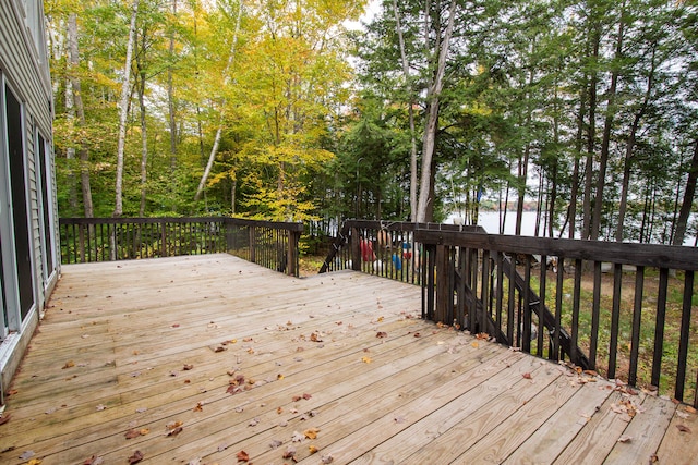 wooden terrace with a water view