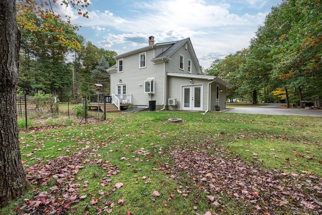 459 Durham Rd, Brunswick, ME 04011 - view of property exterior featuring french doors, a chimney, and a deck