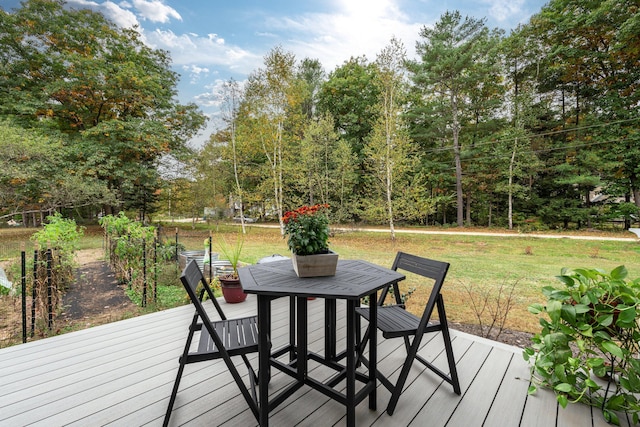 459 Durham Rd, Brunswick, ME 04011 - wooden deck featuring outdoor dining area and a yard