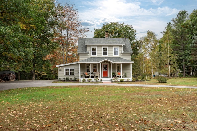459 Durham Rd, Brunswick, ME 04011 - view of front of house featuring covered porch, a front yard, a chimney, and a shingled roof
