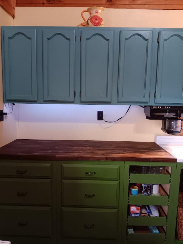 kitchen featuring blue cabinetry