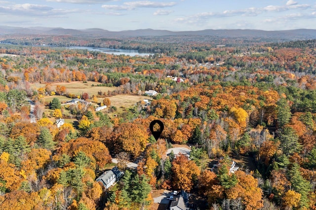 aerial view featuring a water and mountain view