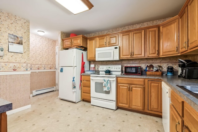 kitchen with a baseboard heating unit and white appliances