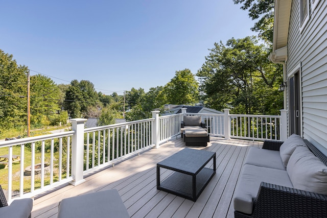 wooden deck with outdoor lounge area