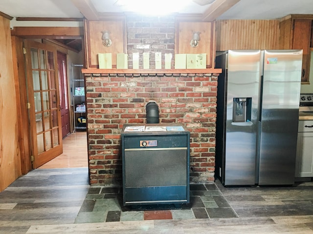 kitchen featuring beamed ceiling, stainless steel refrigerator with ice dispenser, and dark hardwood / wood-style flooring