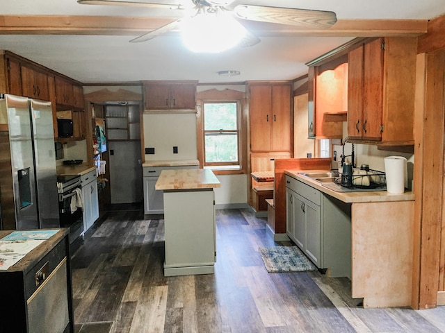 kitchen featuring a kitchen island, stainless steel refrigerator with ice dispenser, dark wood-type flooring, and butcher block counters