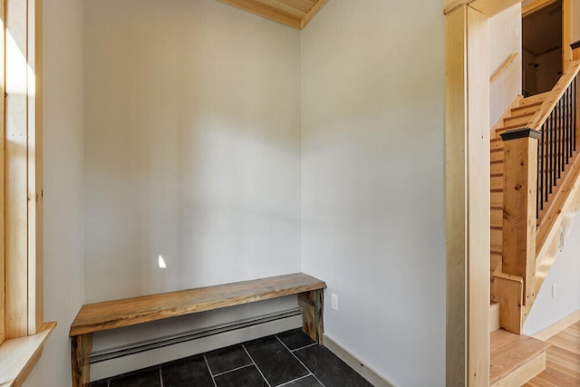 mudroom featuring hardwood / wood-style floors and a baseboard radiator