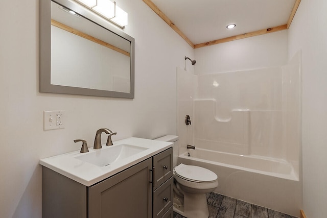 bathroom featuring shower / tub combination, vanity, toilet, and wood finished floors