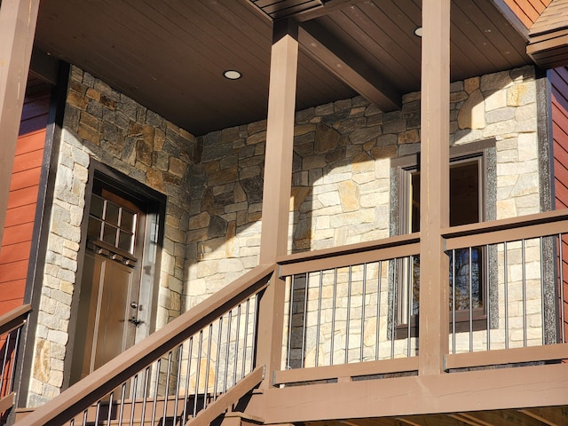 interior space with beam ceiling and wood ceiling