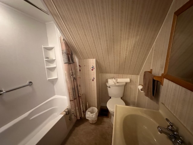 full bathroom featuring sink, shower / tub combo, vaulted ceiling, and toilet