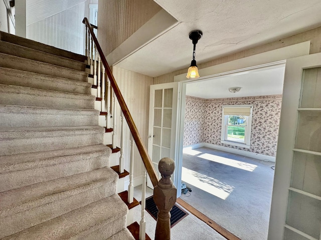 stairs with carpet floors