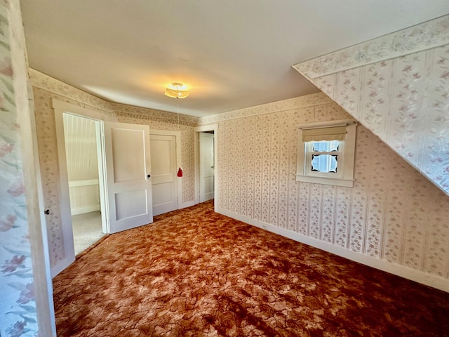 additional living space with carpet floors