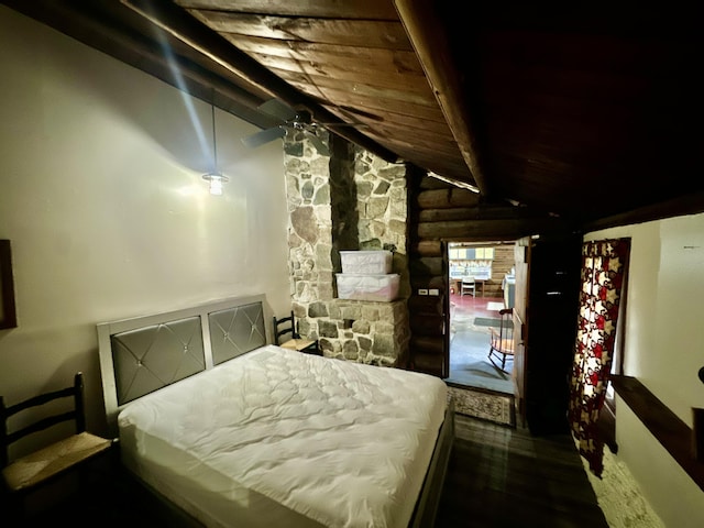 bedroom featuring ceiling fan, lofted ceiling, dark wood-type flooring, and wood ceiling