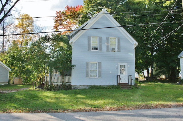 view of front of house with a front lawn