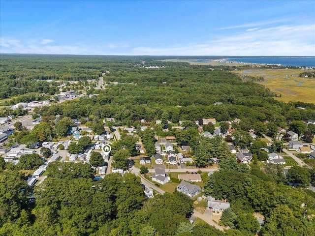 bird's eye view featuring a wooded view