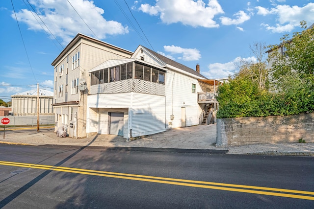 view of front of property with a garage