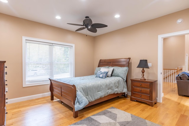 bedroom featuring ceiling fan and light wood-type flooring