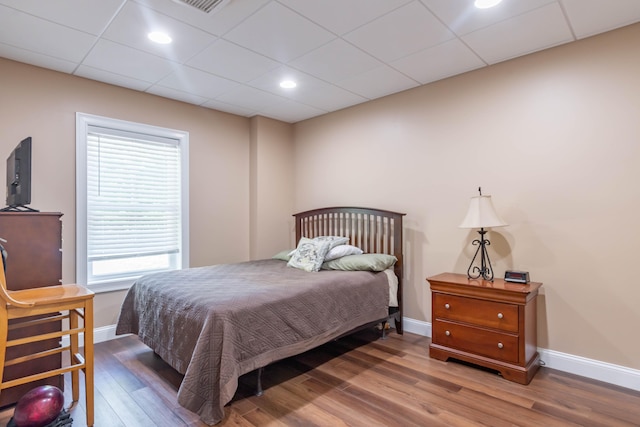 bedroom featuring hardwood / wood-style floors