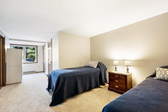 bedroom featuring light colored carpet and a baseboard heating unit