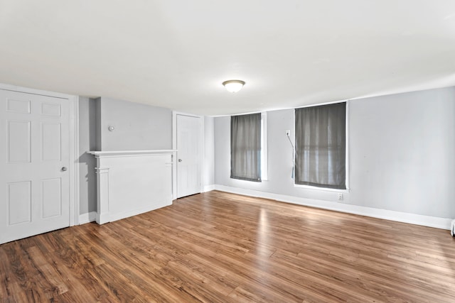 unfurnished room featuring hardwood / wood-style floors