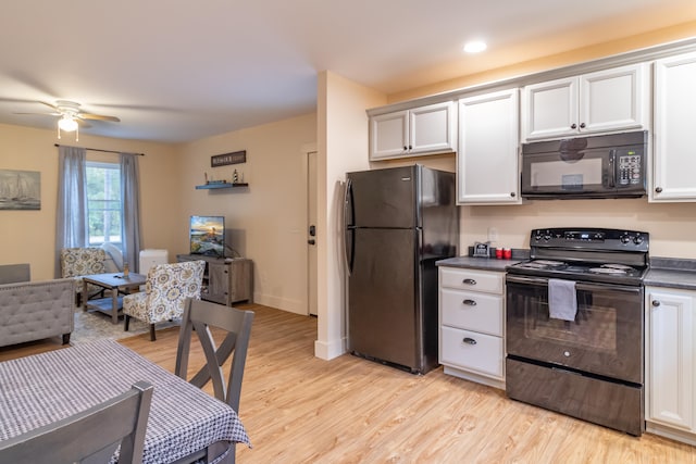 kitchen with white cabinetry, black appliances, light wood-type flooring, and ceiling fan