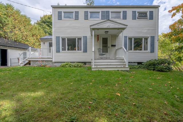 colonial home with a front yard