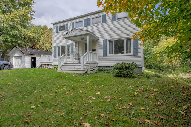 view of front facade featuring a shed and a front lawn