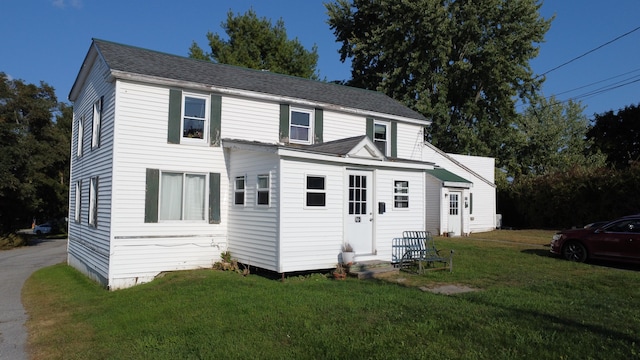 exterior space featuring a front lawn