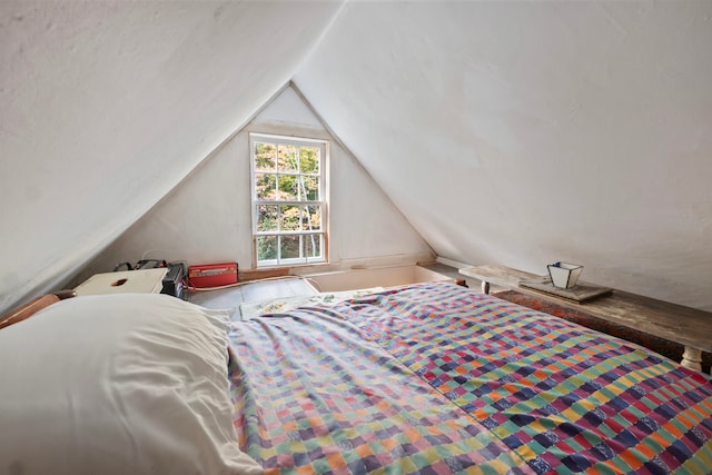 bedroom with vaulted ceiling