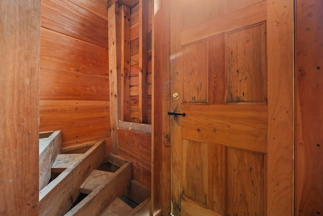 view of sauna featuring wood walls