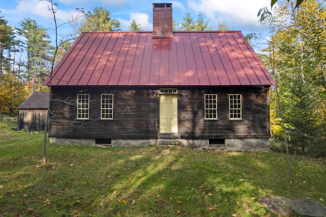 exterior space with a lawn