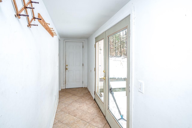 entryway featuring light tile patterned floors