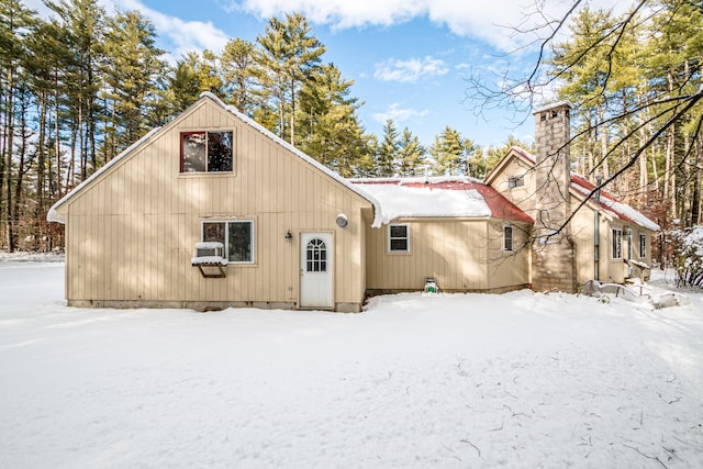 view of snow covered house