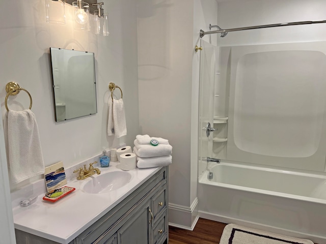 30 Water St, Ellsworth, ME 04605 - bathroom featuring vanity, hardwood / wood-style floors, and shower / bath combination