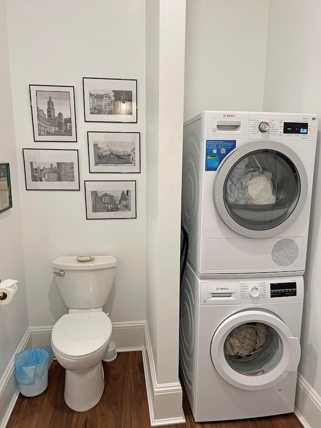 30 Water St, Ellsworth, ME 04605 - laundry room with stacked washer and clothes dryer and hardwood / wood-style floors