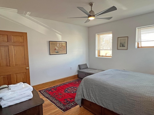 30 Water St, Ellsworth, ME 04605 - bedroom with multiple windows, wood-type flooring, and ceiling fan